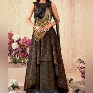 Gold and black Indian outfit with A line skirt.